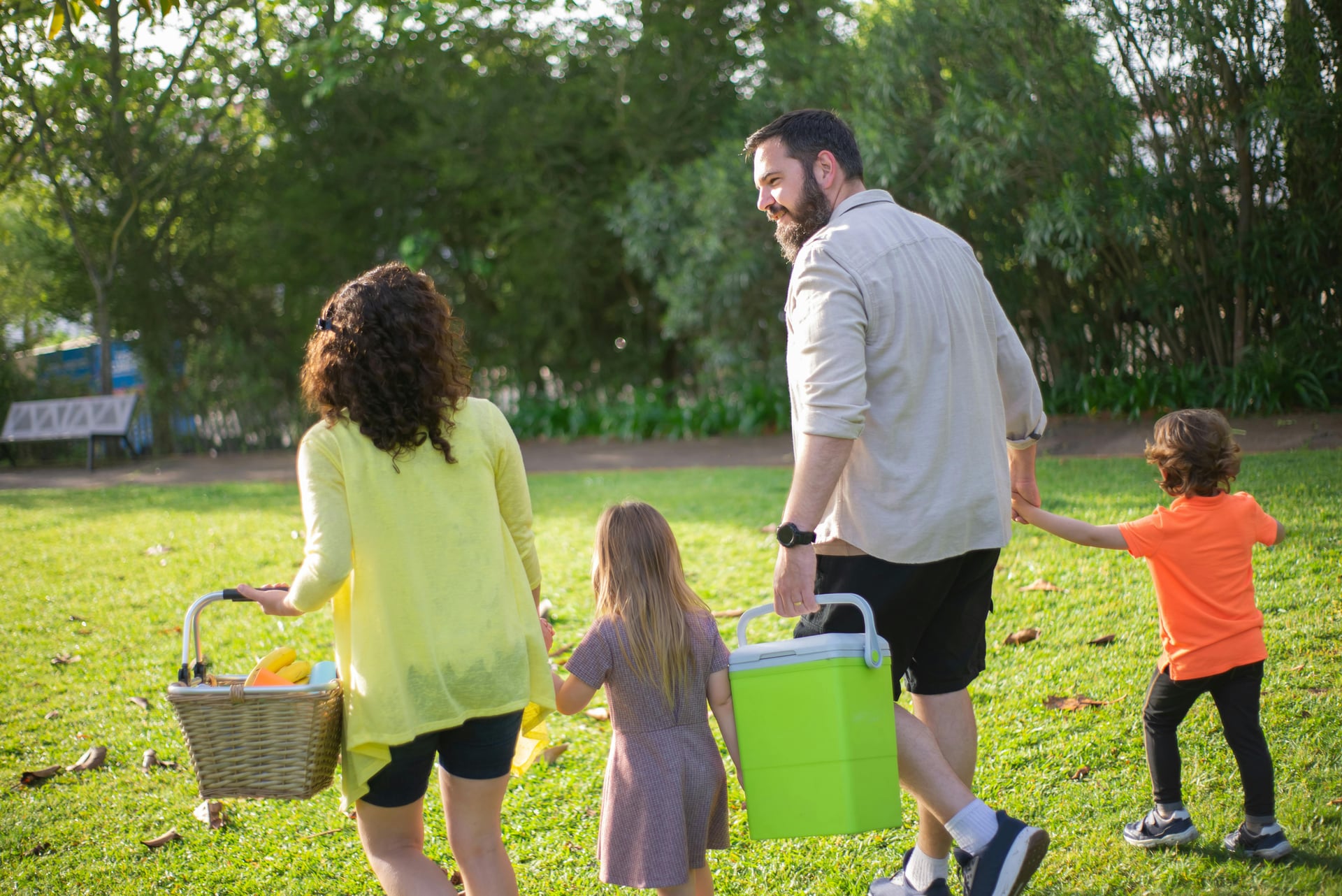 Family walking together outdoors after family therapy, symbolizing connection and balance in Vaughan